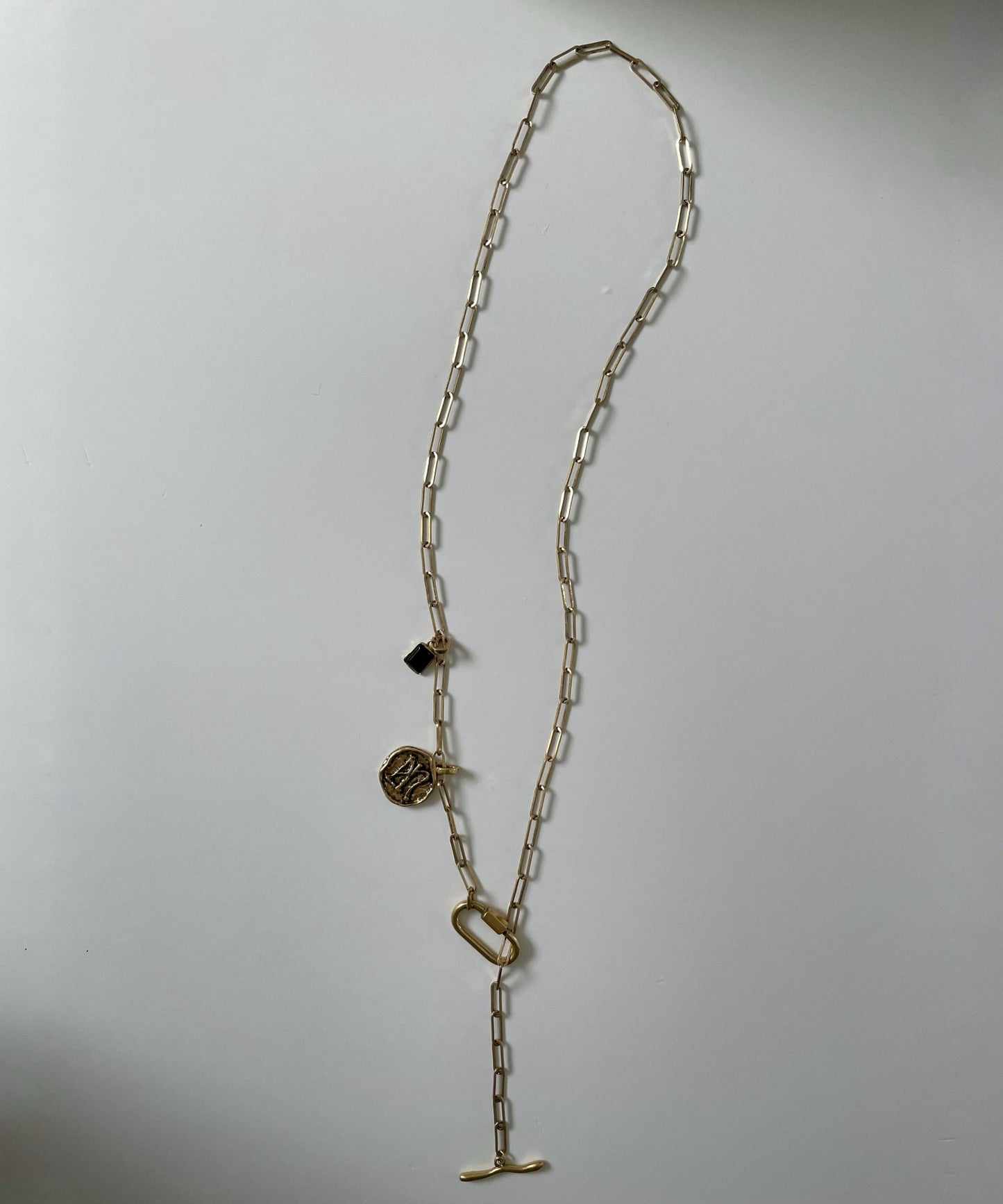 Coin charm tie