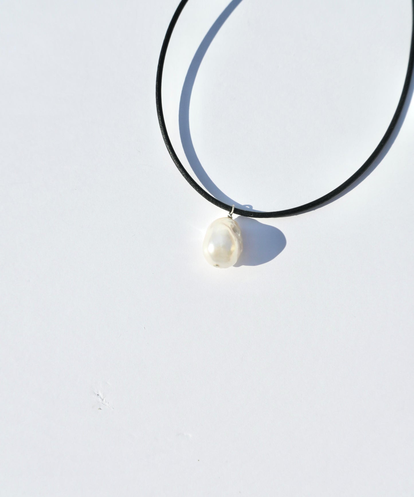 pearl leather code necklace